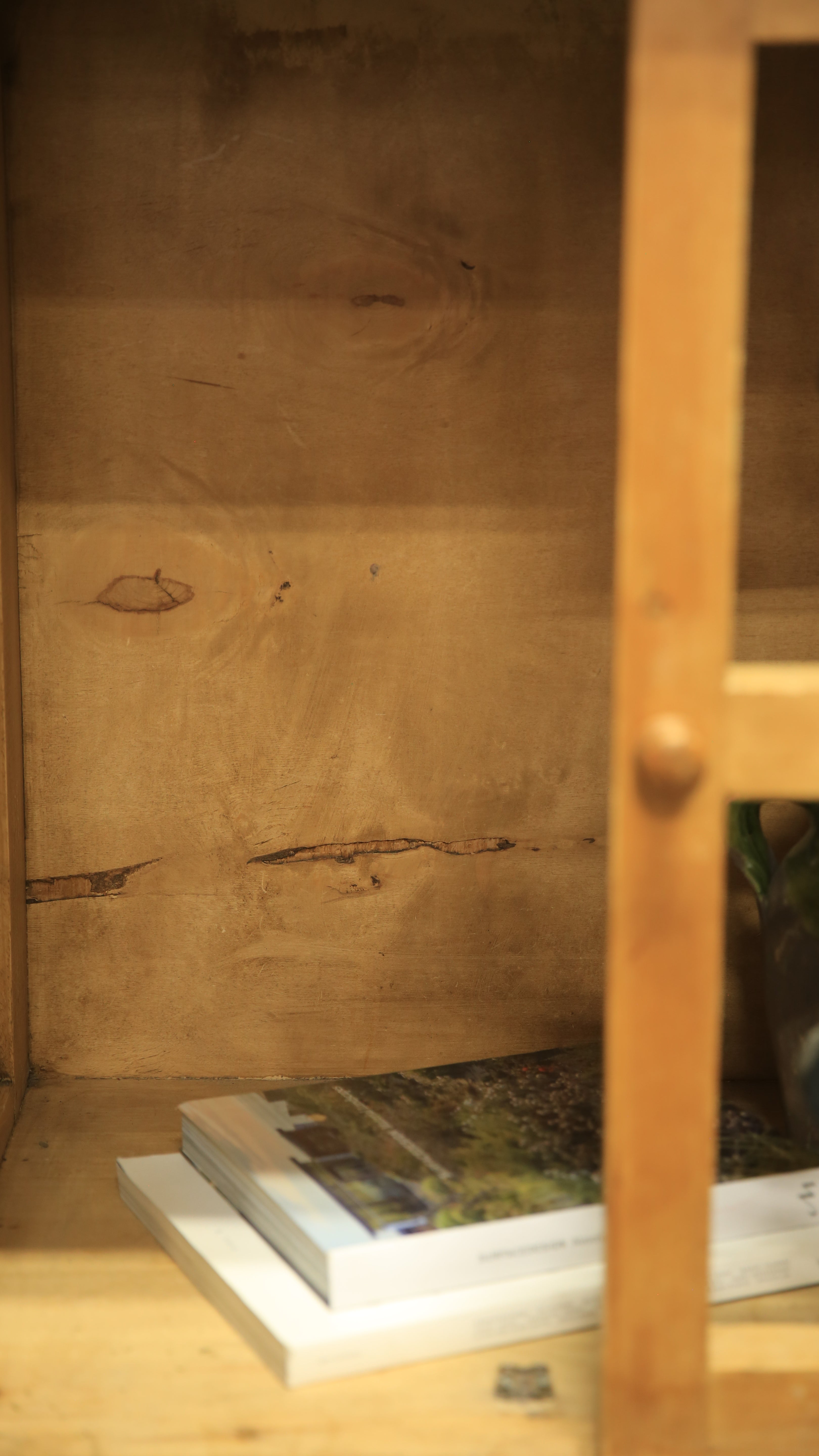 Wooden shelf with a cracked wooden surface