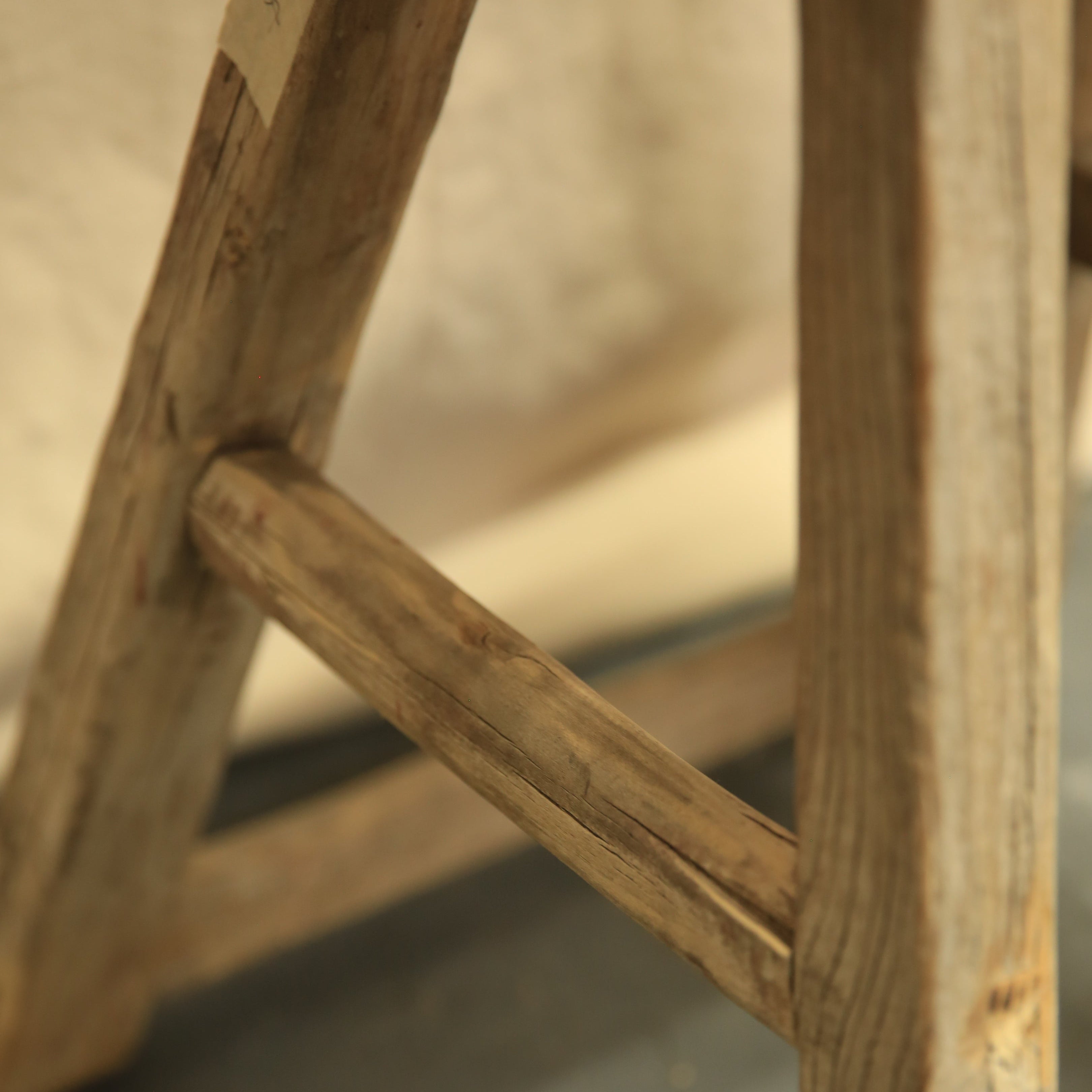 Close-up of a wooden structure with a blurred background