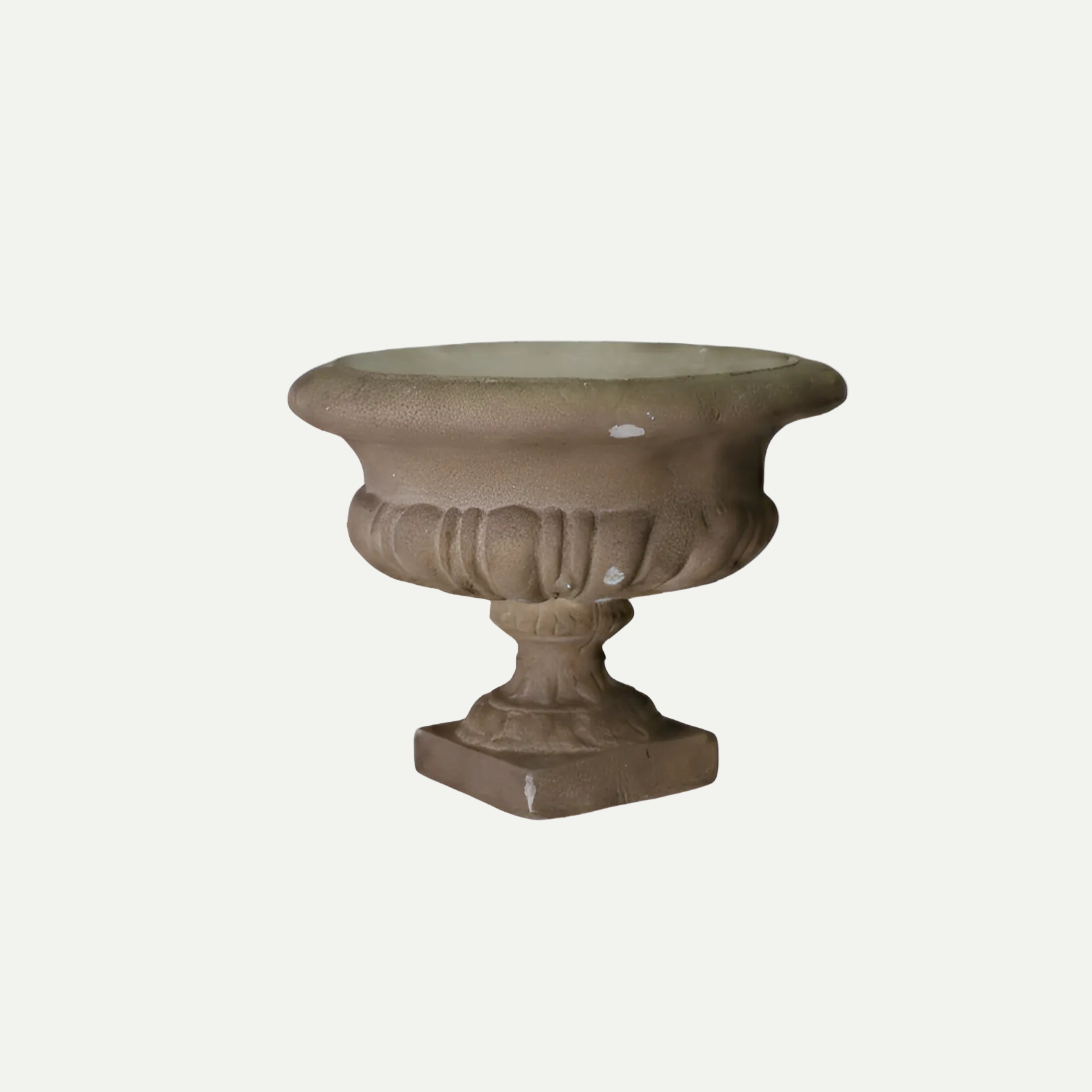 Decorative stone urn on a white background