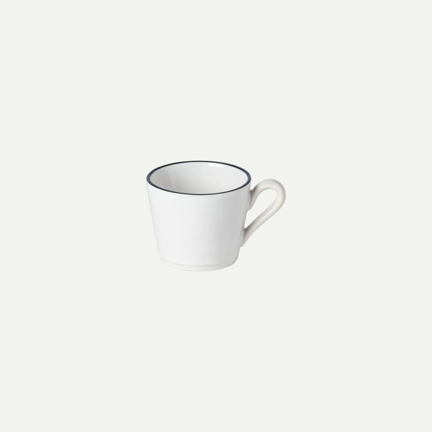White mug with black rim on a white background