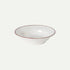 White ceramic bowl with a thin brown rim on a white background
