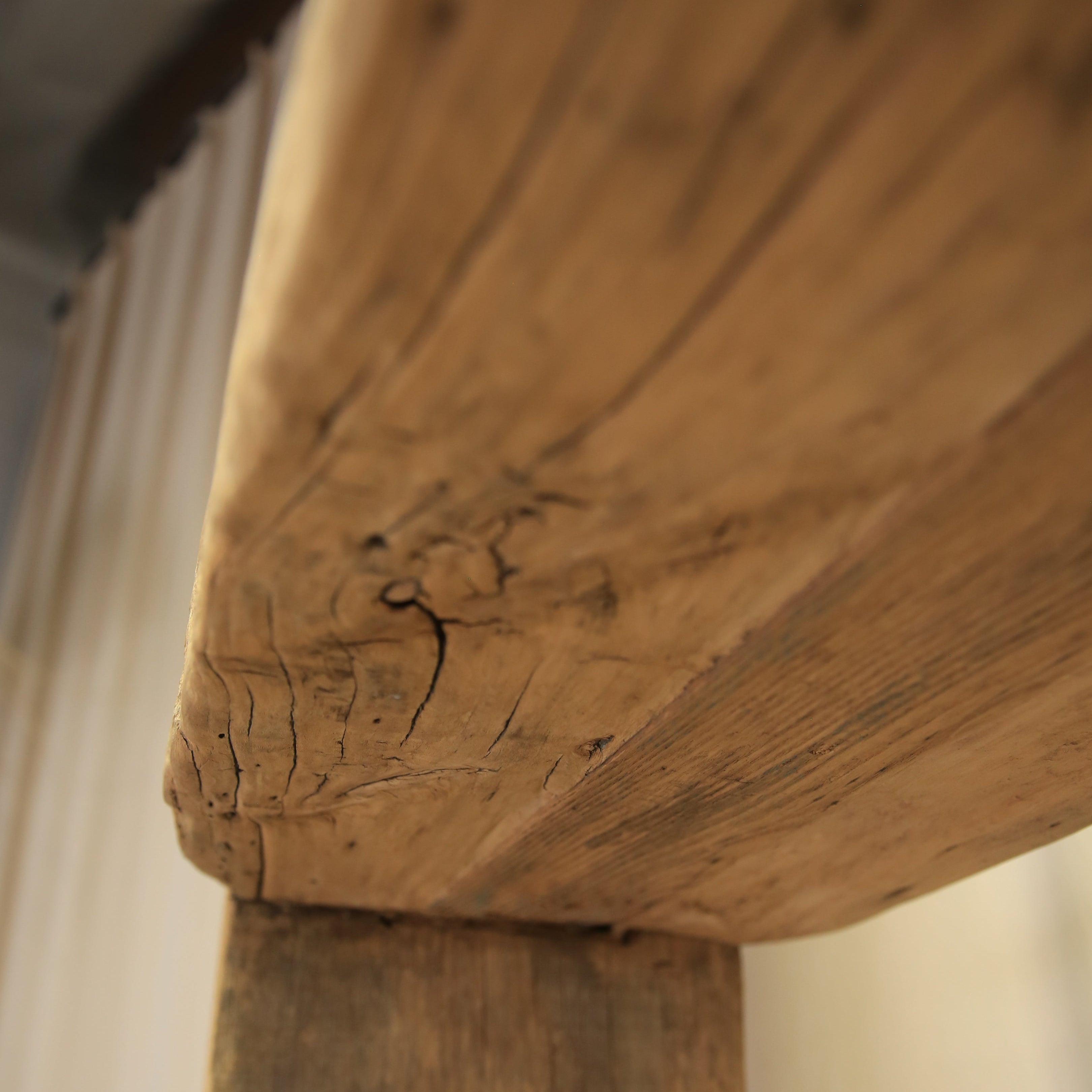 Close-up of a wooden surface with visible grain and texture