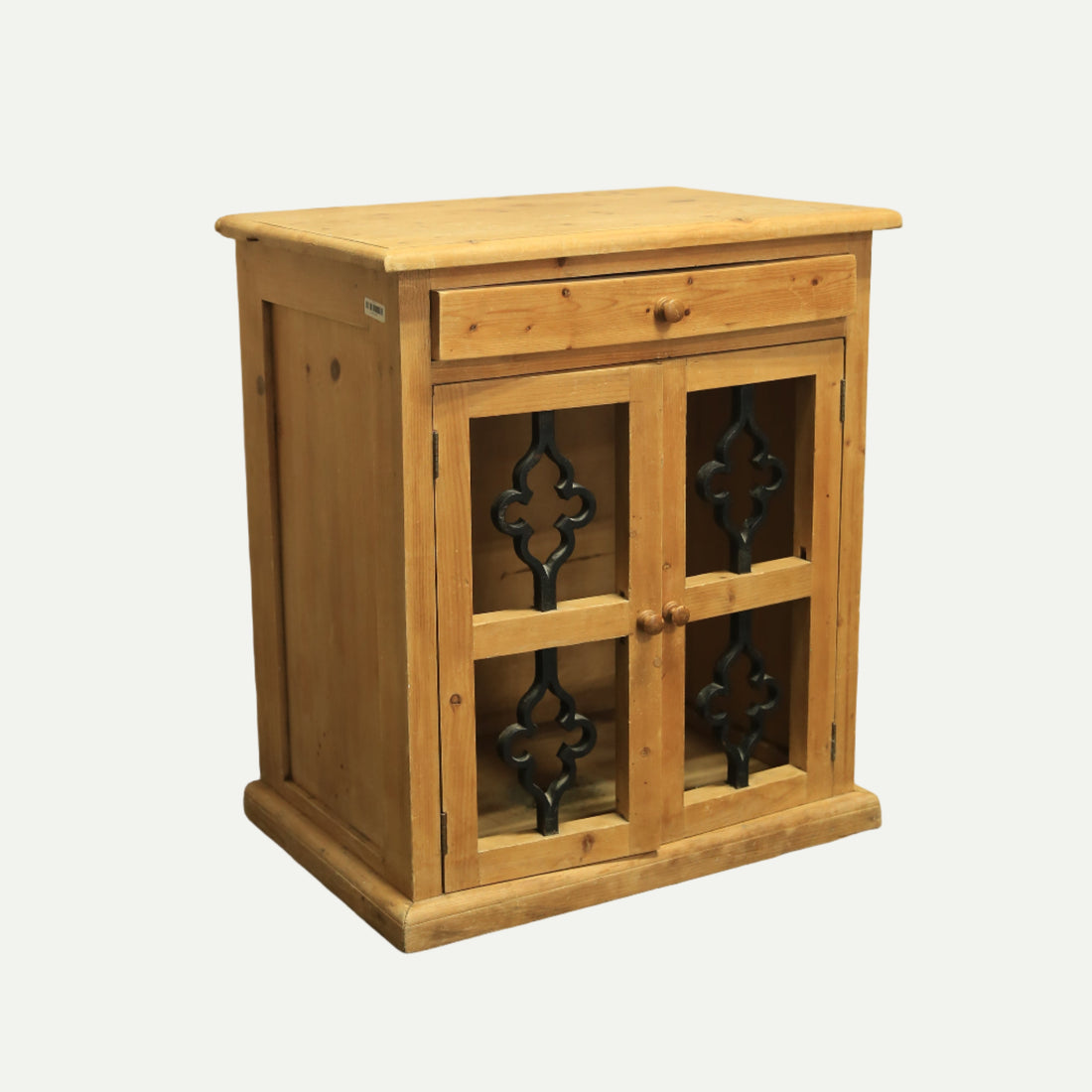 Wooden cabinet with glass doors and metal fixtures on a white background
