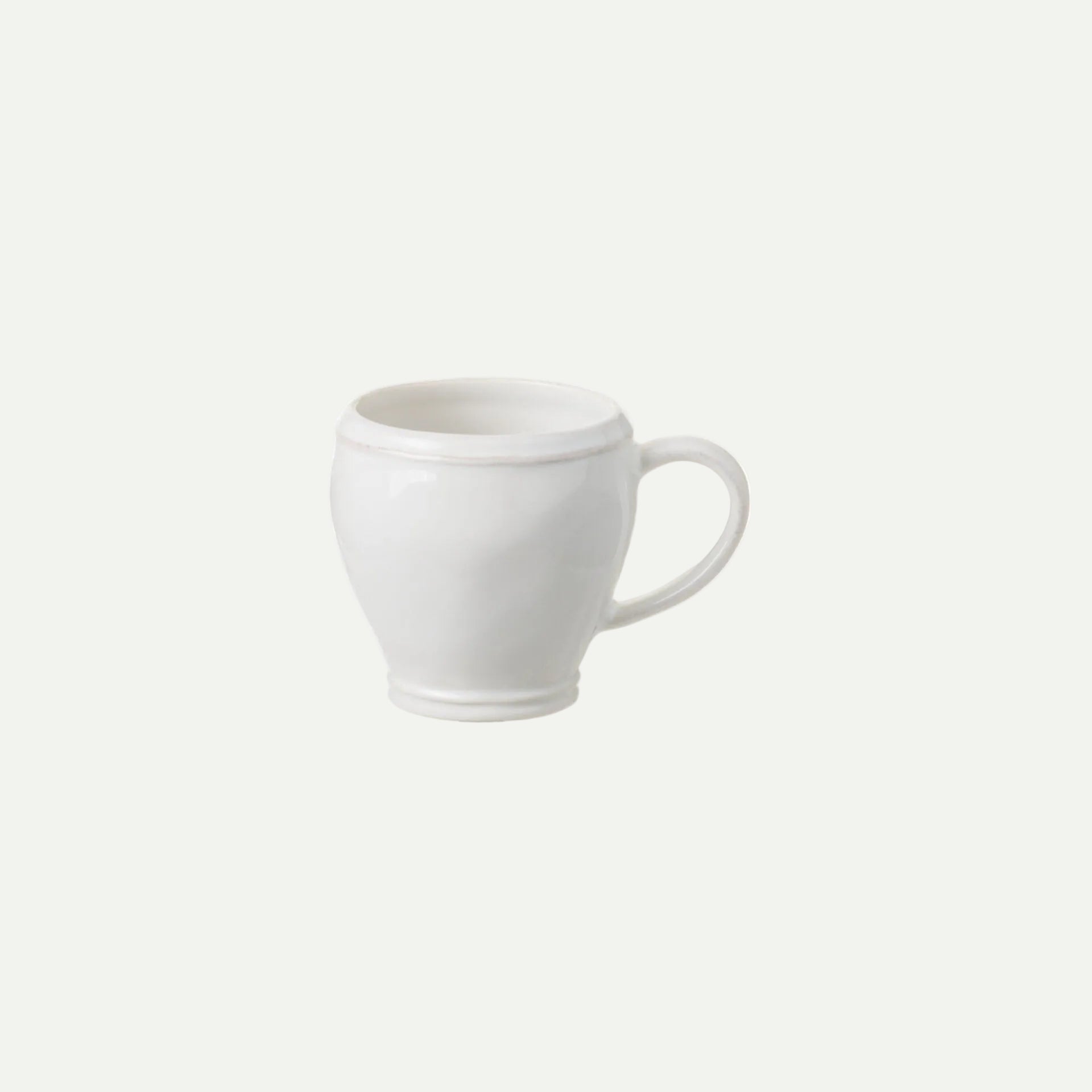 White ceramic mug on a white background