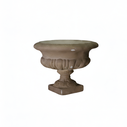 Decorative stone urn on a white background