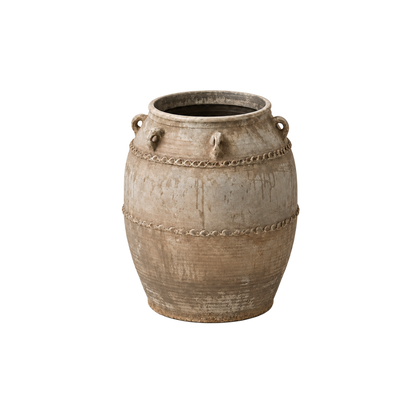 A rustic ceramic planter pot with a textured, distressed finish in earthy beige and brown tones, featuring decorative chain-like bands and side handles, isolated on a white background.