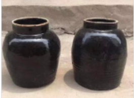 Classical black glazed pottery urn