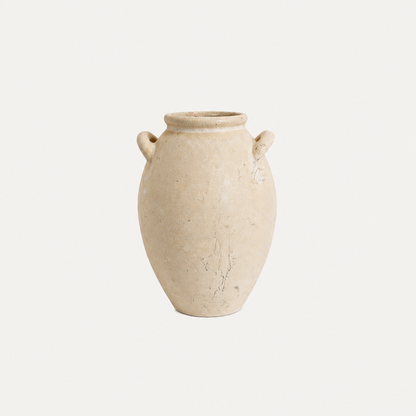 Beige ceramic vase with two handles on a white background